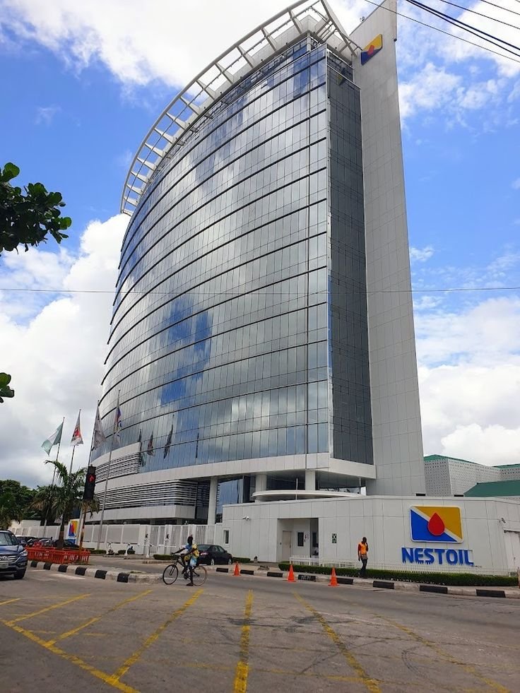 Location reference: a glass office tower on a Lagos street